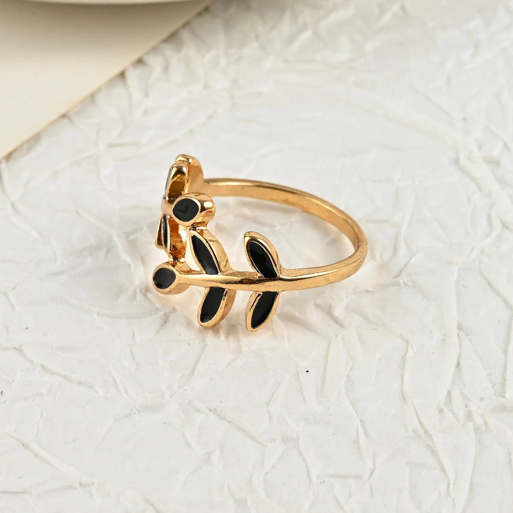 Gold electroplated acrylic leaf geometric ring with flower shape and botanical design