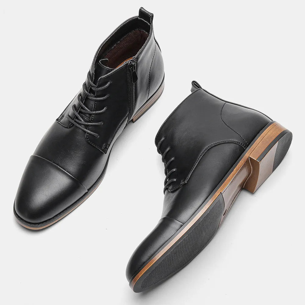 Men's plus size brown Chelsea ankle boot with a side zip, round toe, and low wooden sole.