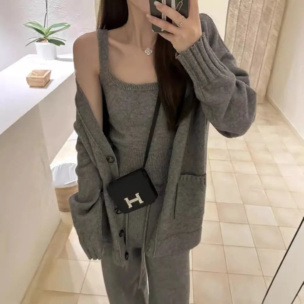 Women's wool blend knit three-piece set showing vest, cardigan coat, and pants in loose fit with seamless construction