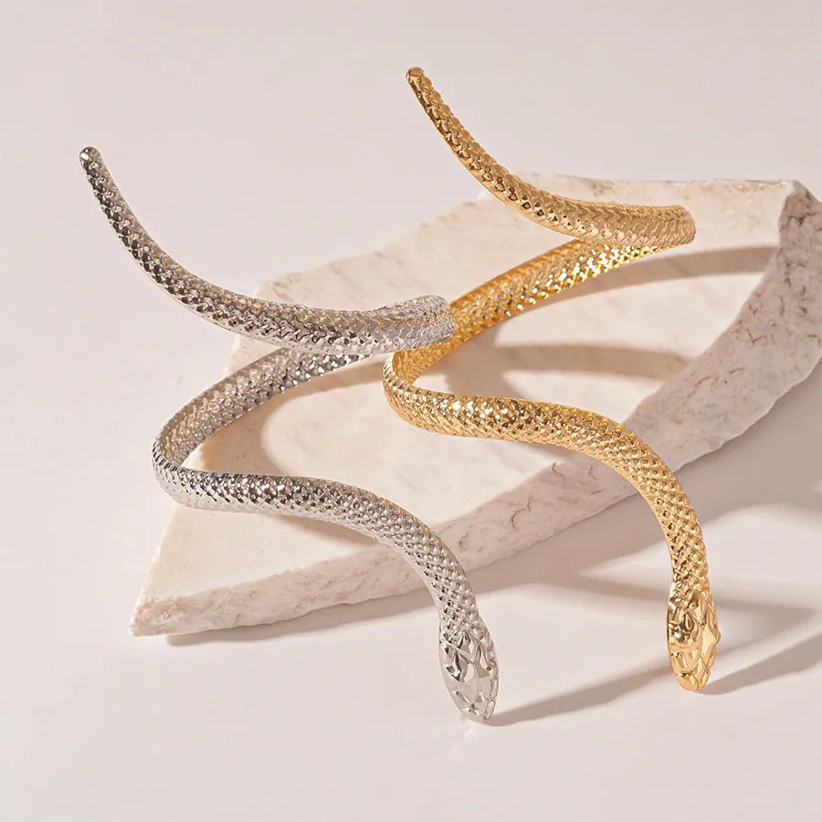 Gold and silver exaggerated twisted winding snake opening ring and bracelet jewellery set