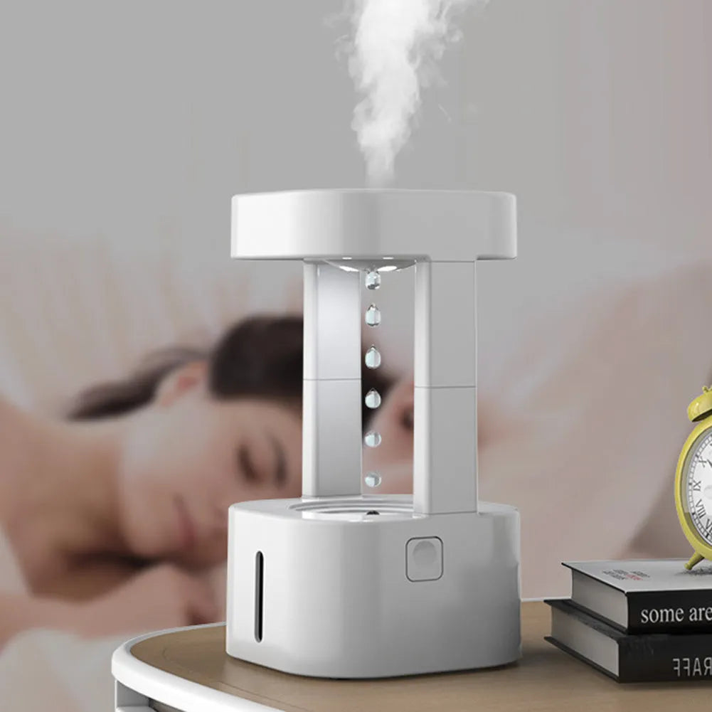 White anti-gravity water drop humidifier with floating droplets illusion and USB cable