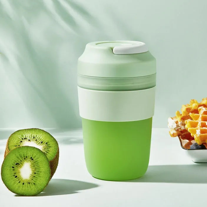 Portable blender juicer cup in green colour with 400ml capacity and stainless steel blades