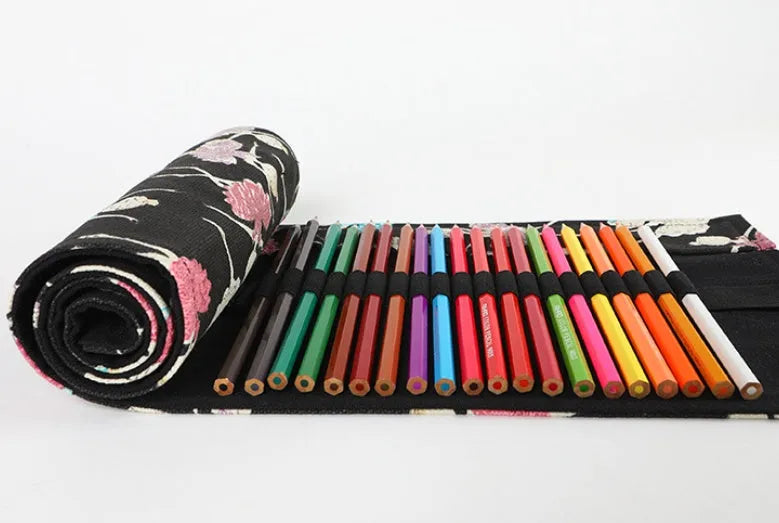 Canvas rolling pencil case with ballet girl print, shown open to reveal multiple pencil slots.