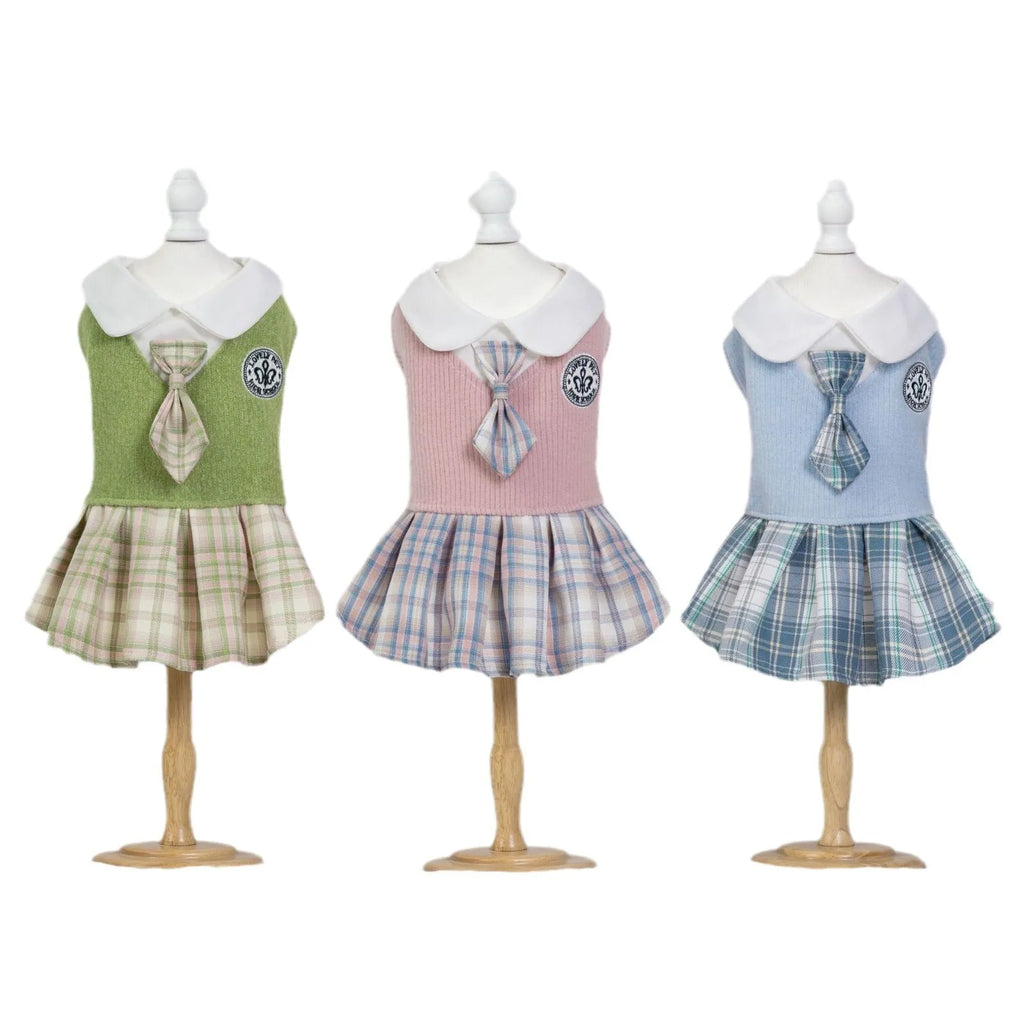 Pink tartan princess-style skirt for small dog on white background showing full skirt design
