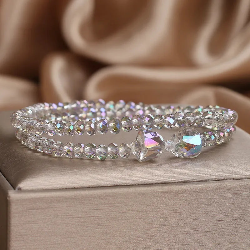 Women's double-circle crystal bow bracelet in white, green, or pink Mori style with colourful crystal design