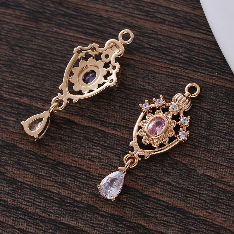 12x23mm water drop-shaped copper pendant with hollow crown design and zircon accents in five colour options