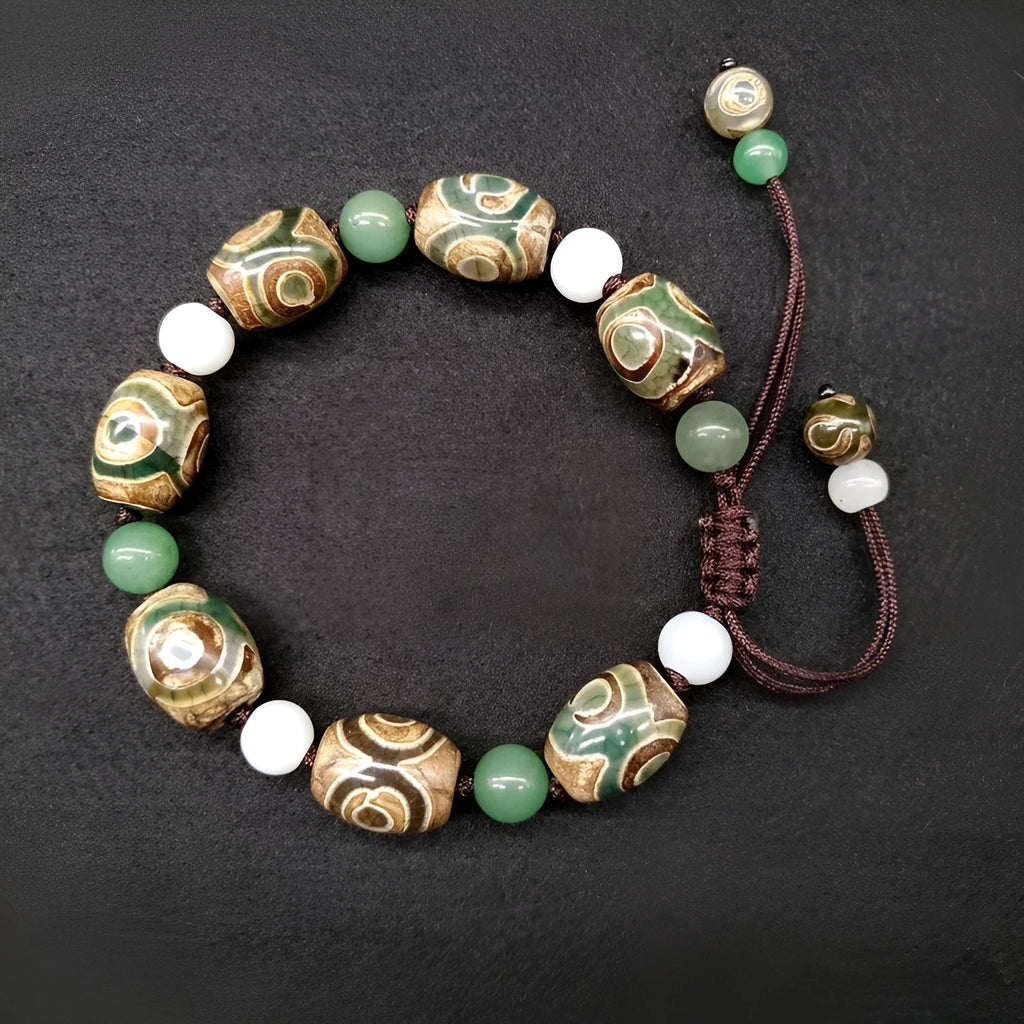 Green agate ethnic bracelet with geometric three-eye beads and adjustable closure
