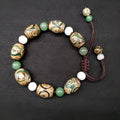 Green agate ethnic bracelet with geometric three-eye beads and adjustable closure