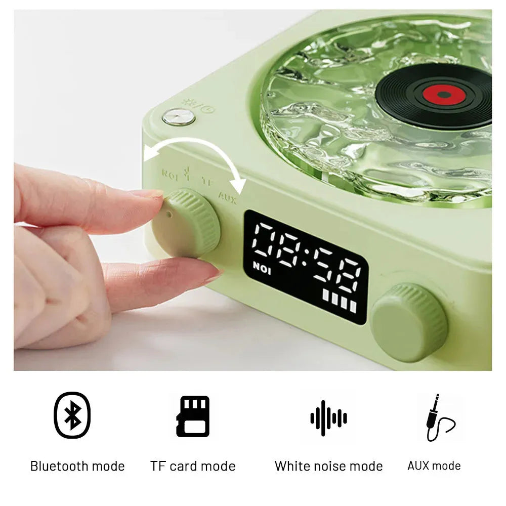 Retro-style Bluetooth speaker with rotating vinyl turntable and RGB coloured lighting effects