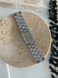 Bracelet-style watch for women with slim 7mm profile and butterfly buckle