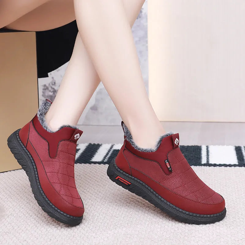 Women's black casual flat boots with round toe and non-slip rubber soles