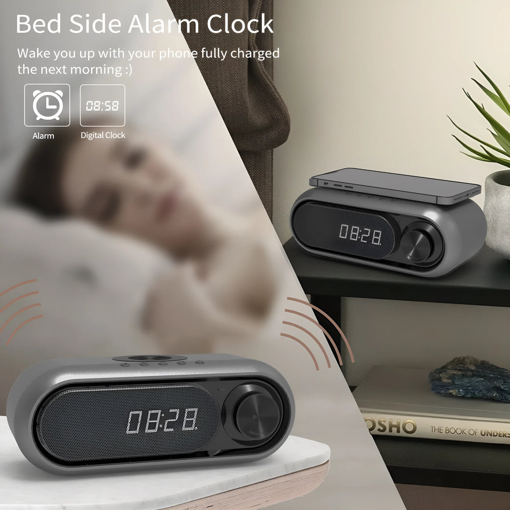 Space grey wireless charging alarm clock with Bluetooth speaker and LED display.