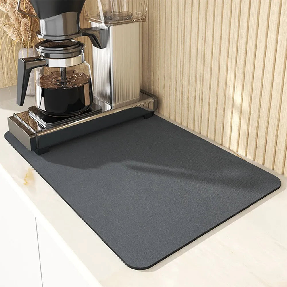 Square technical cloth dish drying mat with PU leather surface and rubber anti-slip backing.
