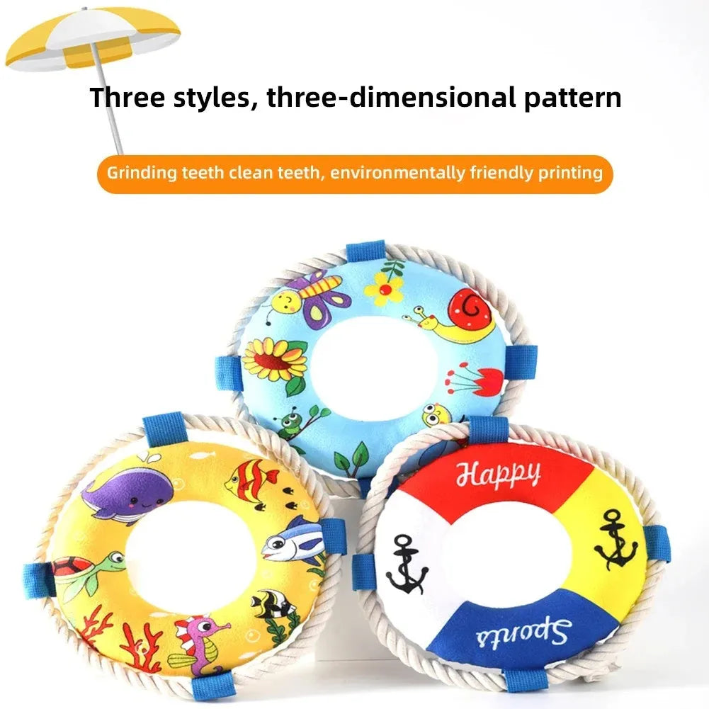 Squeaky dog training ring toy in blue, red or yellow with soft plush construction for fetch and chew games