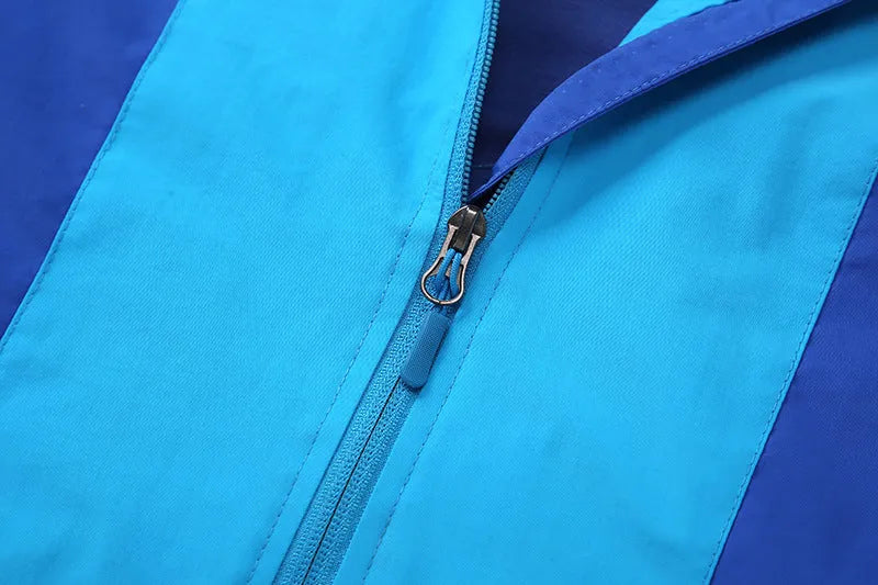Blue thin children's jacket with full zip and long sleeves for ages 8+