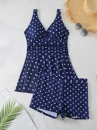 Women's blue polka dot plus size bikini with skirted briefs and matching top