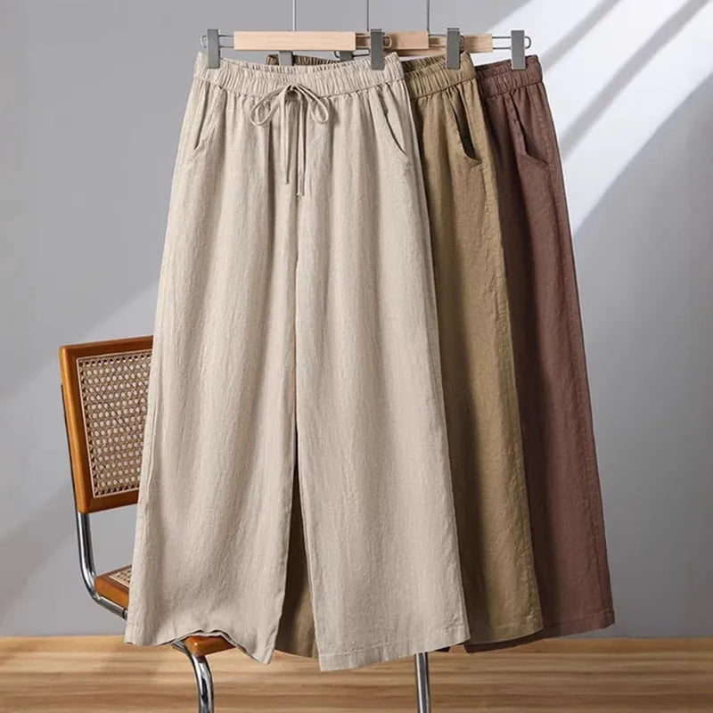 Women's straight-leg casual trousers with elastic waistband and lace-up detail in apricot colour