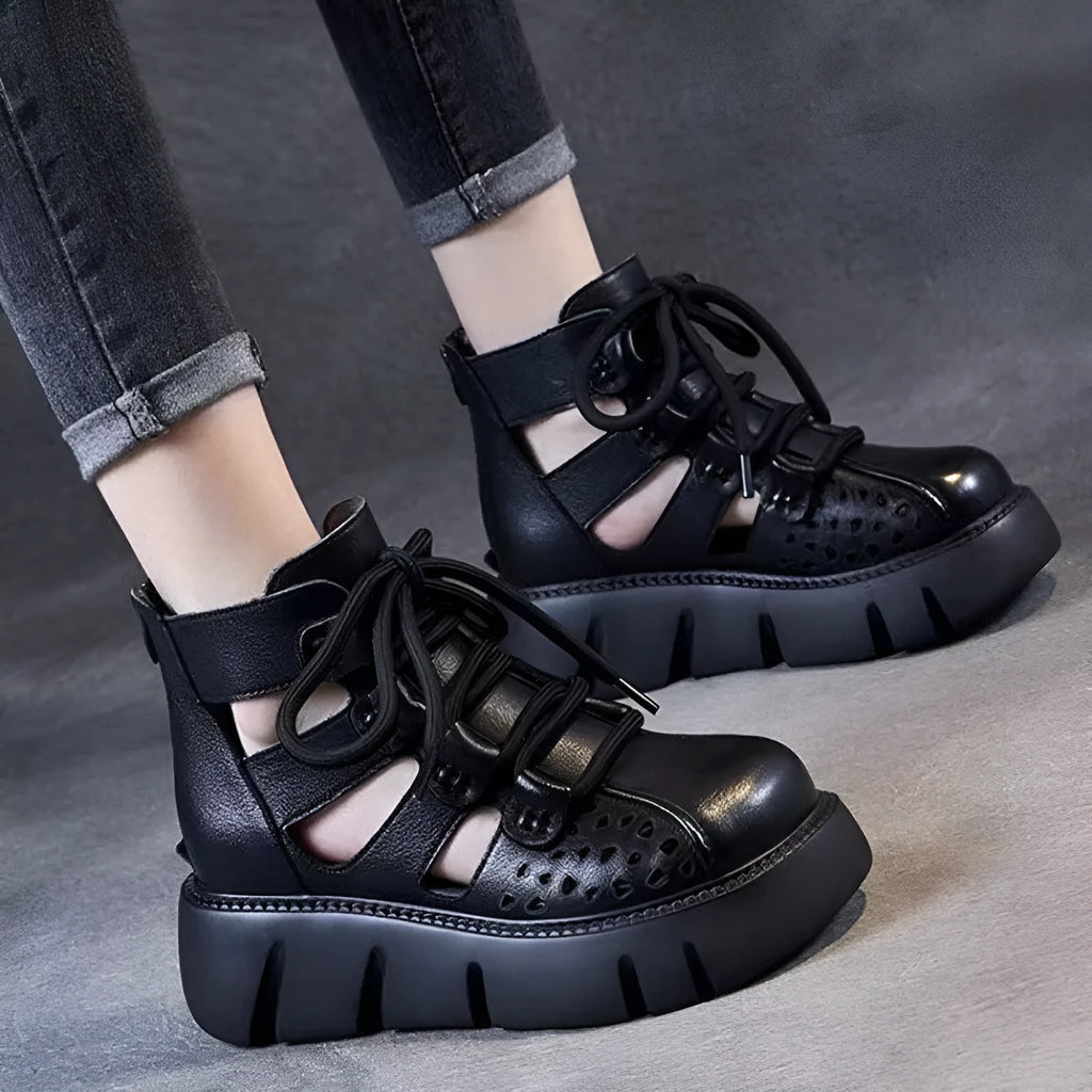 Women's black platform sandals with fish mouth toe and hollow hole design on plush upper