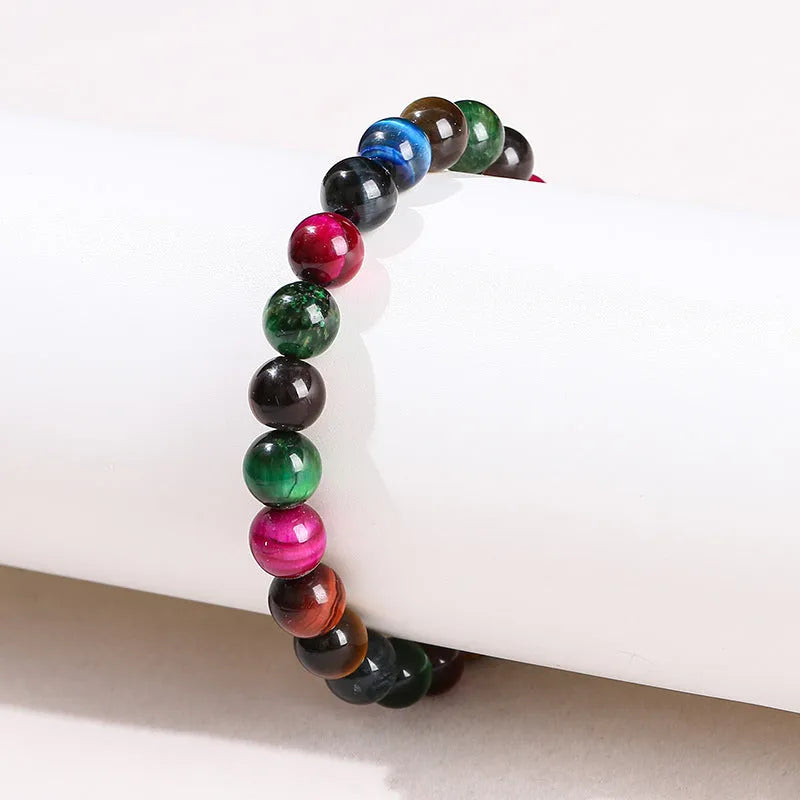 Women's natural Tiger Eye beaded bracelet with colourful mixed stones in round shapes.