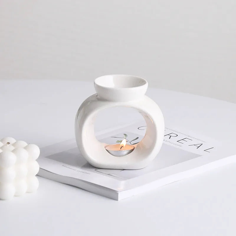 White ceramic aromatherapy stove ornament with Nordic design and anti-dry burning safety feature