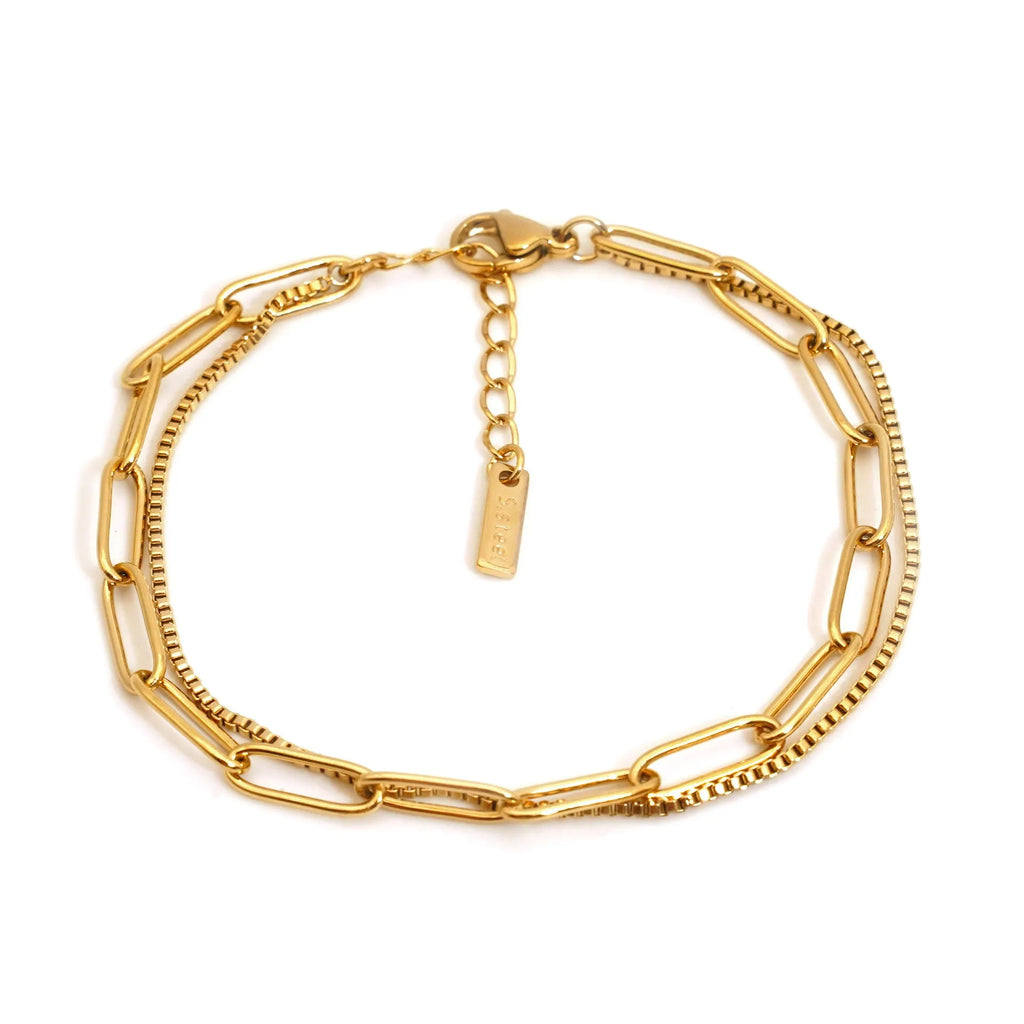 Double layer twin stainless steel bracelet in gold or silver with geometric line design.