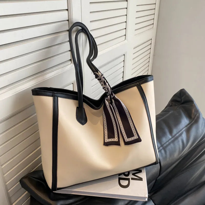 Soft PU leather winter commuter shoulder bag with open pockets and internal organisation compartments