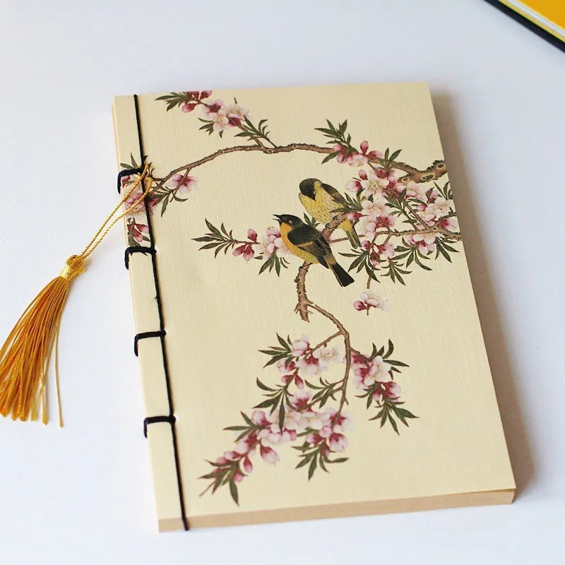 A5 antique-style wire-bound notebook with vintage Chinese painting cover, thread binding, and black wax rope tassel.
