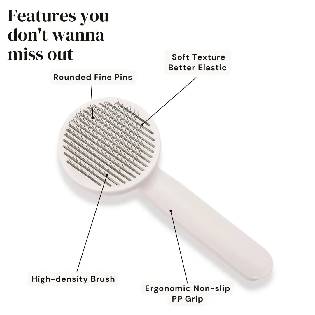 Self-cleaning slicker brush for dogs and cats with stainless steel pins and ergonomic handle