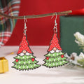Wooden Christmas earrings with 3.5cm tree and 4cm snowman geometric shapes featuring printed festive details
