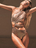 Women's one-piece swimsuit in solid gold colour with backless design and spandex material for high elasticity.