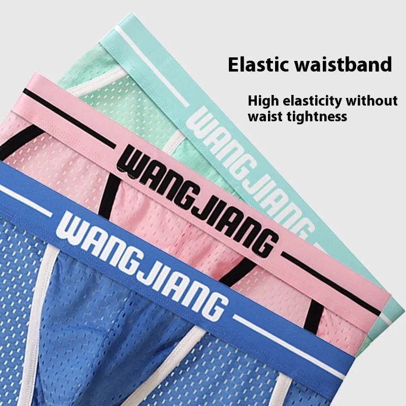 Men's black mesh ice silk triangular underwear laid flat, showing briefs style and breathable fabric texture.
