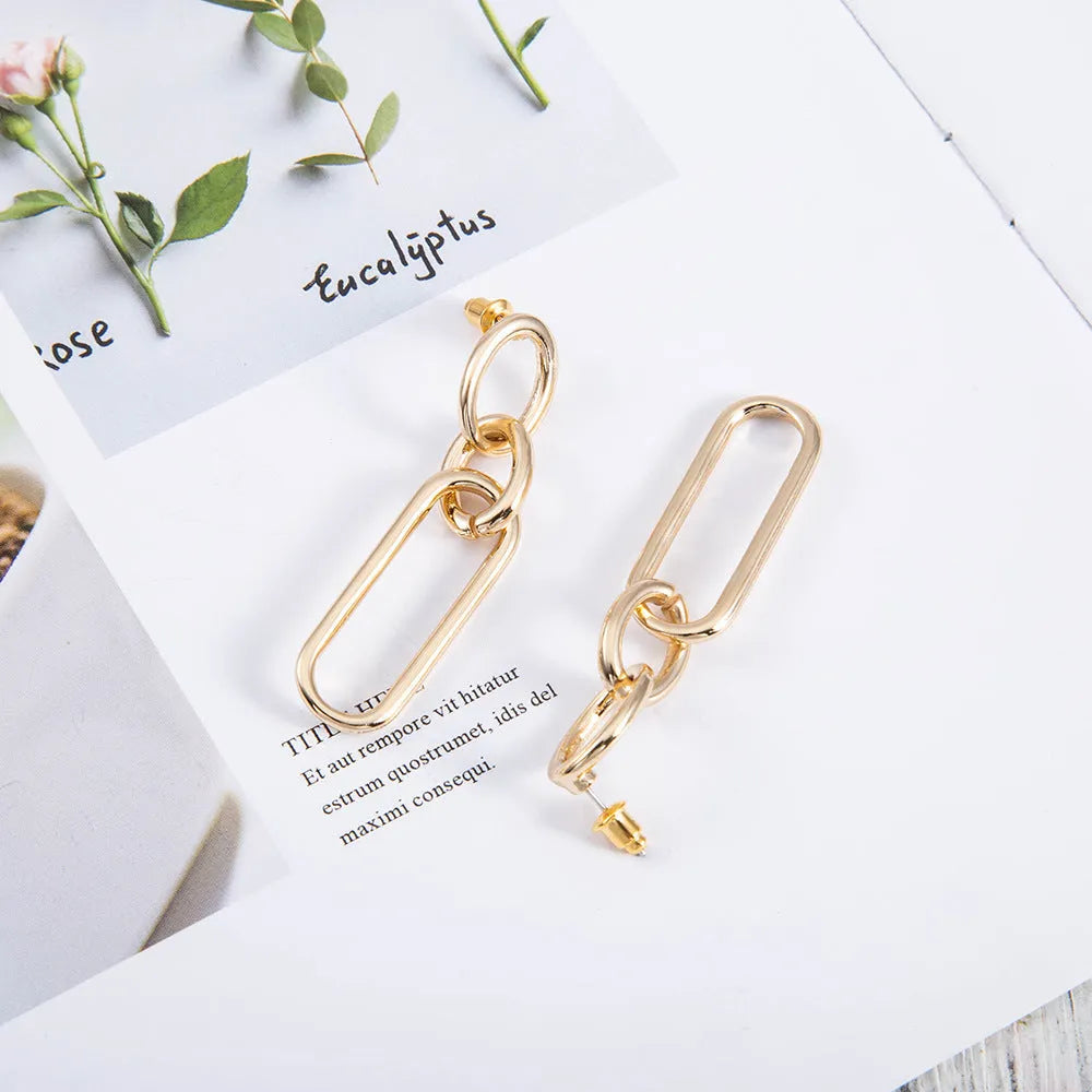 Sterling silver geometric hoop earrings with electroplated finish and needle post design
