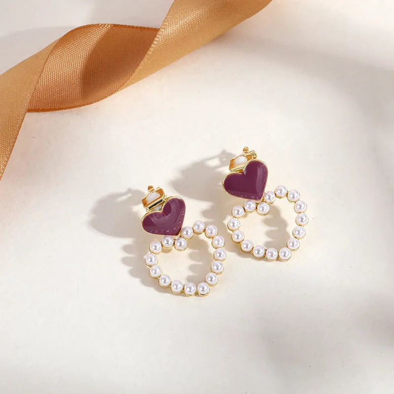 Geometric tassel ear clips for non-pierced ears in brass and electro-stainless steel with electroplated finish