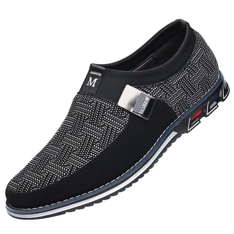 Men's grey and white square toe casual shoes with a low-top synthetic leather upper and flat rubber sole.