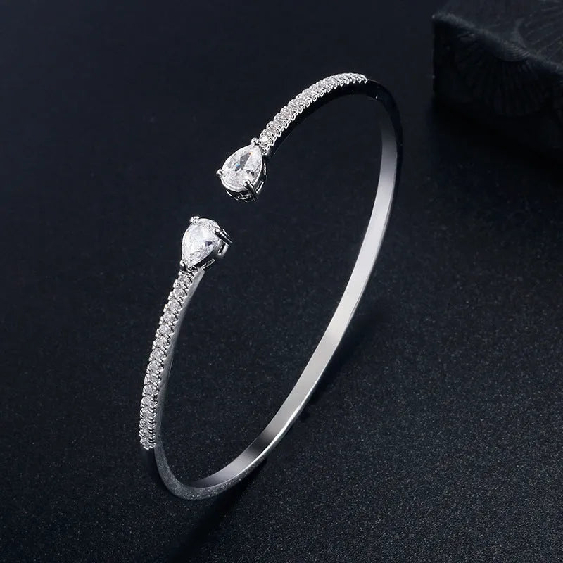 Multi-zircon personalised bracelet with inlaid zircon treatment on copper in white or blue