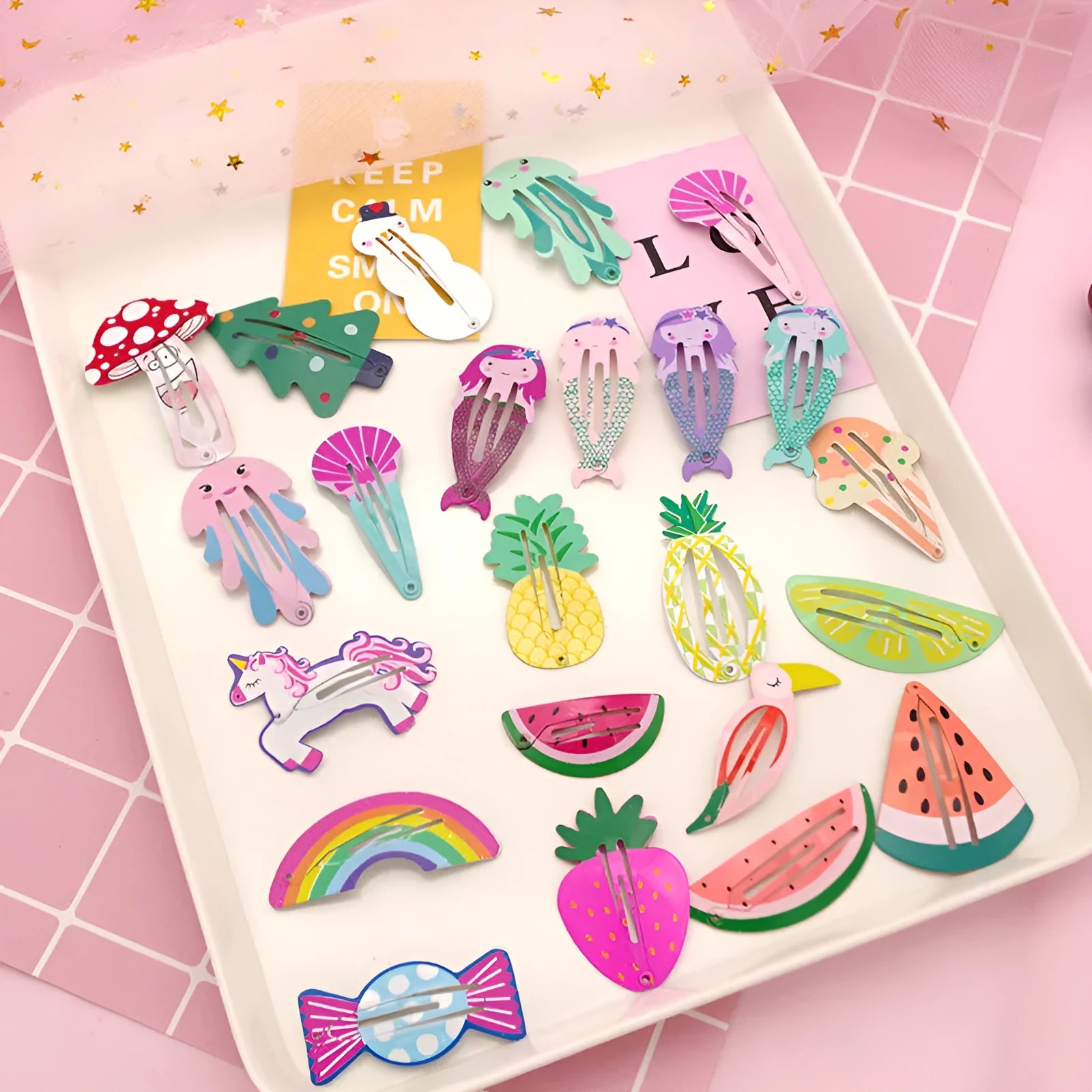 Metal children's hair barrettes with colourful fruit and character designs