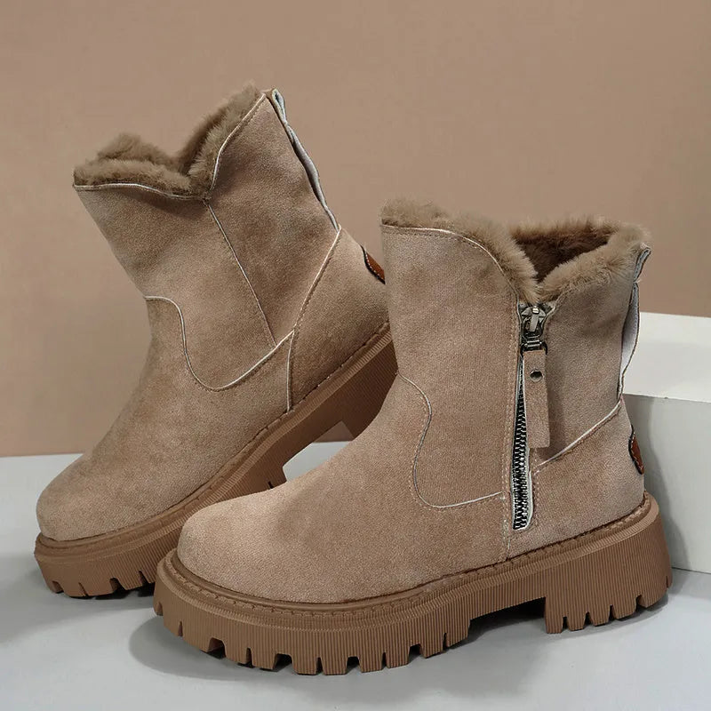 Women's black snow boots with high-top design, side zipper, and non-slip rubber sole for winter