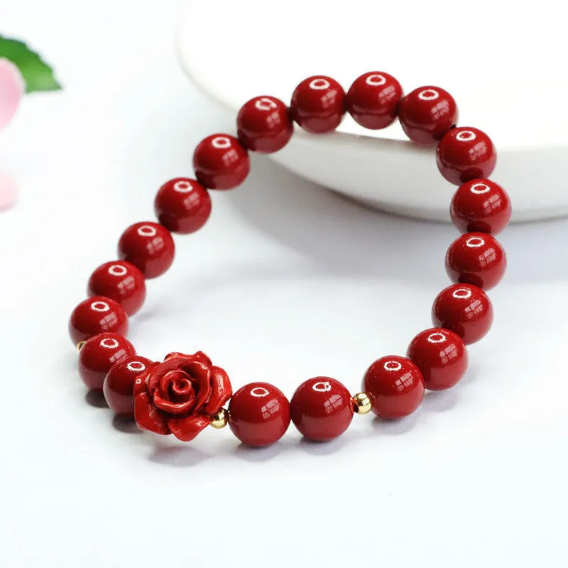 Purple gold sandstone cinnabar bracelet with 8mm rose-carved beads on wrist