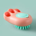 Blue pet bath and massage brush with soft silicone bristles and a plastic handle for cats and dogs.