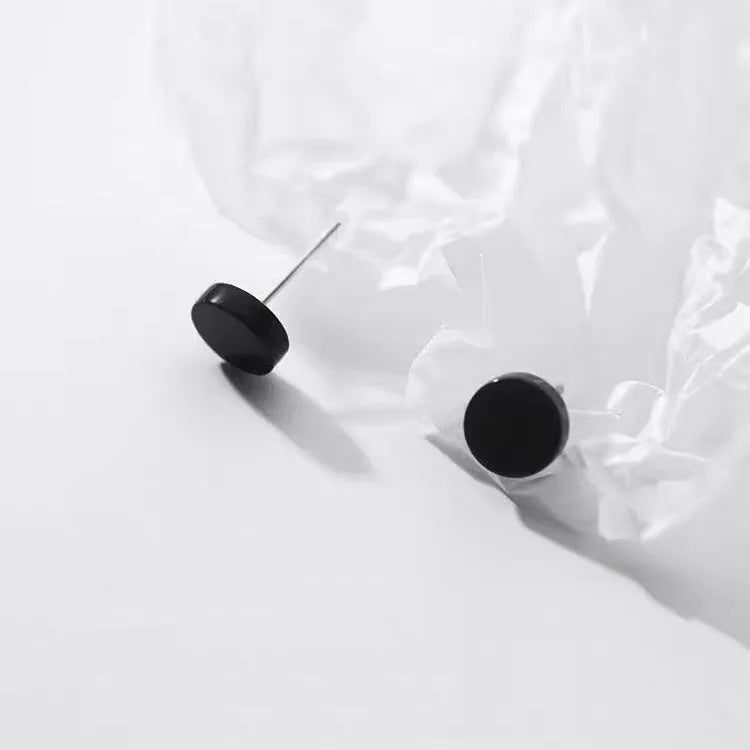 S999 sterling silver flat round ear studs in silver and black colours showing 3mm to 8mm size options