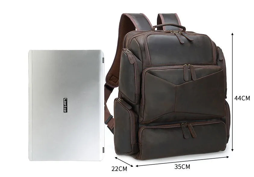 Dark brown genuine cowhide leather backpack with double shoulder straps and organisational compartments for 17-inch laptop