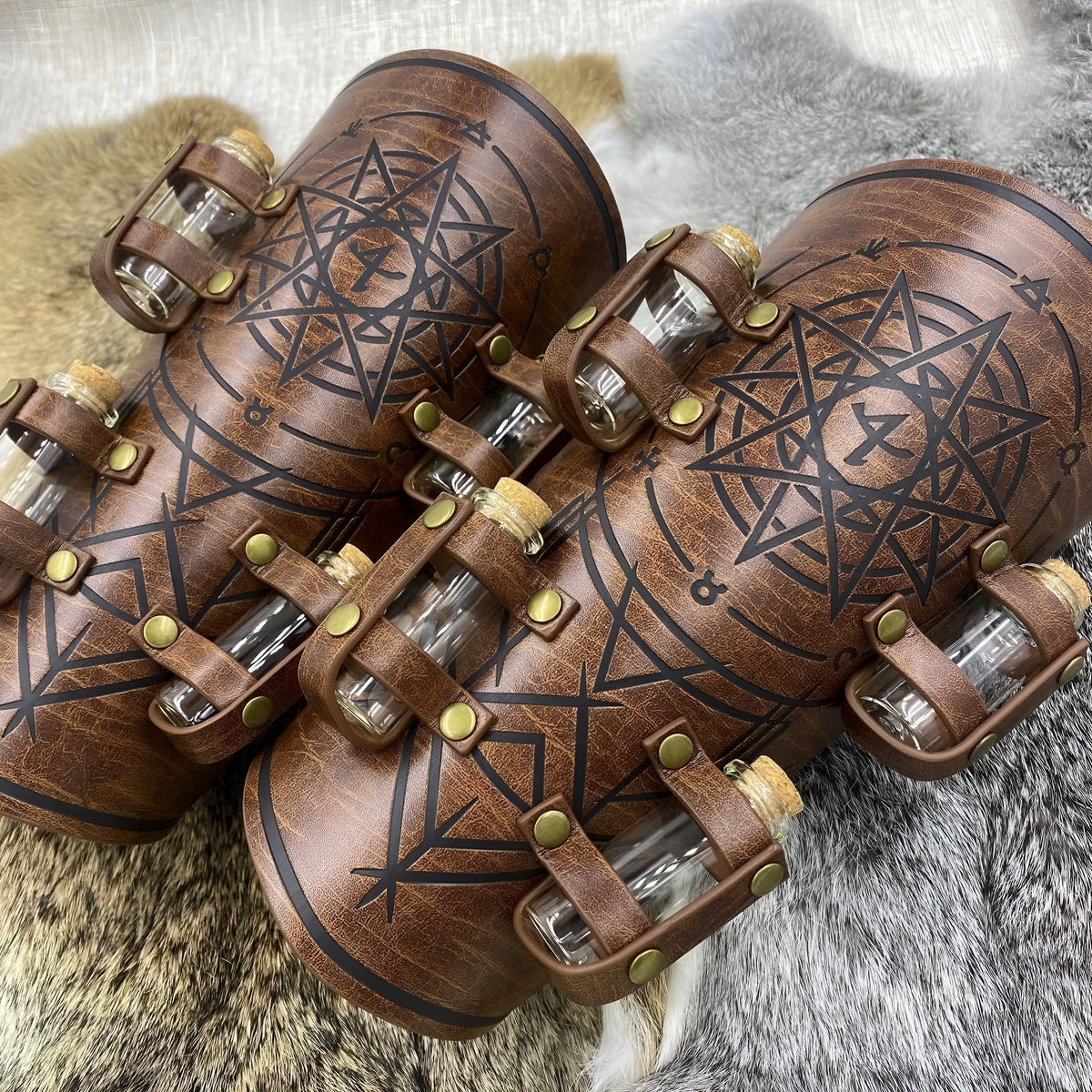 Black PU wristband with medieval alchemy bottle holder, adjustable strap, for LARP and cosplay.