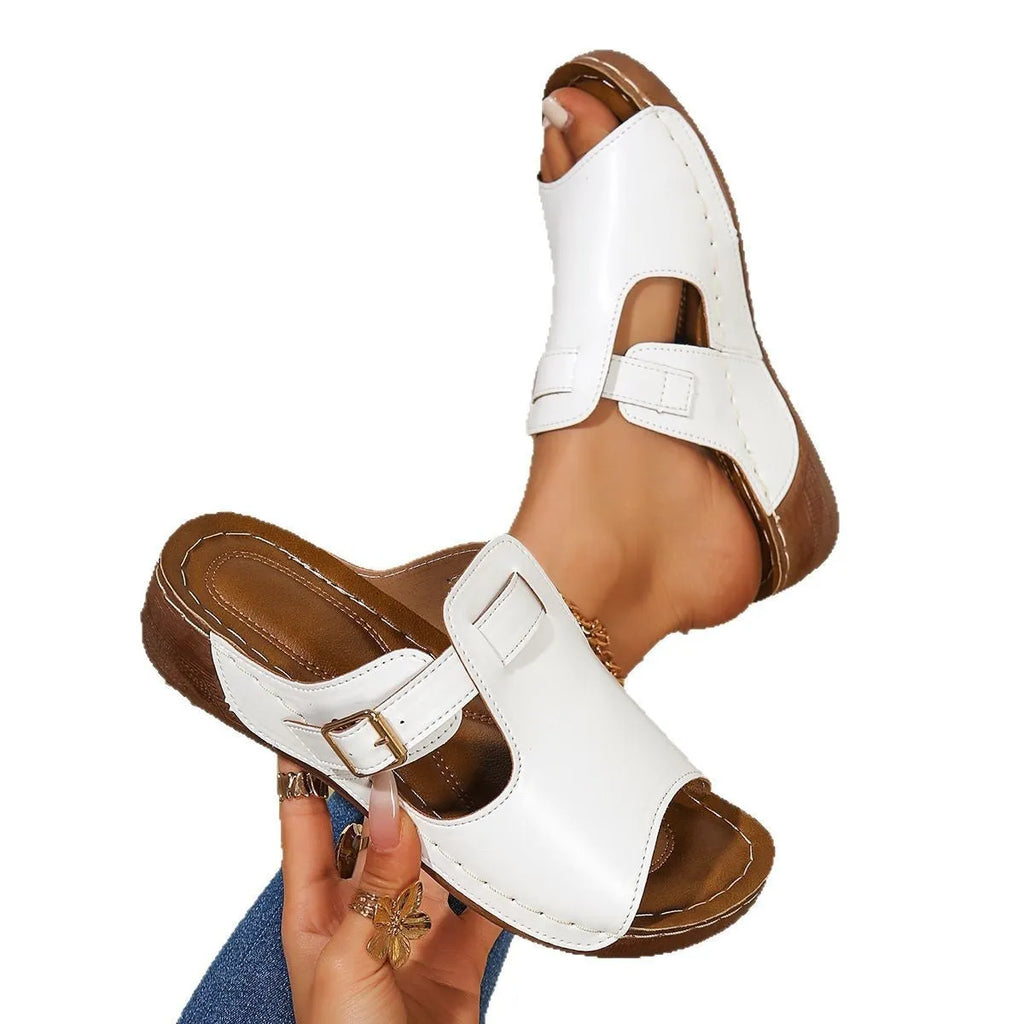 Women's Roman magic stick slippers in light pink with fish-mouth toe and EVA sole.