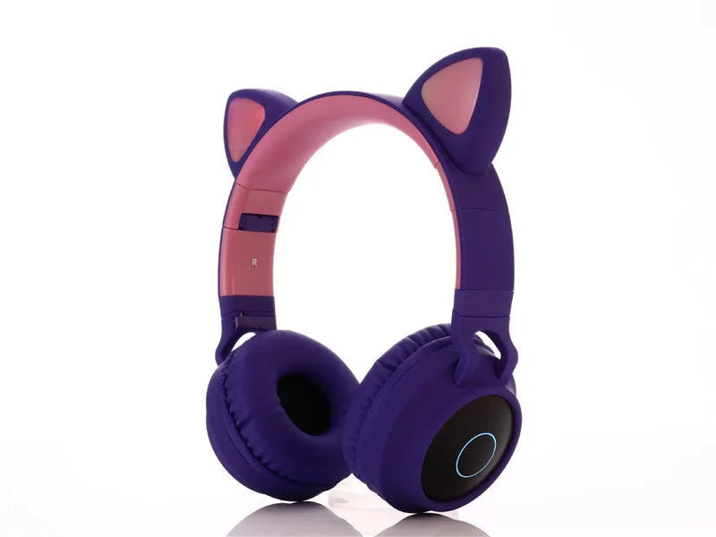 Pink cartoon cat ears wireless Bluetooth headset on a stand with 10-metre range and 148-hour standby