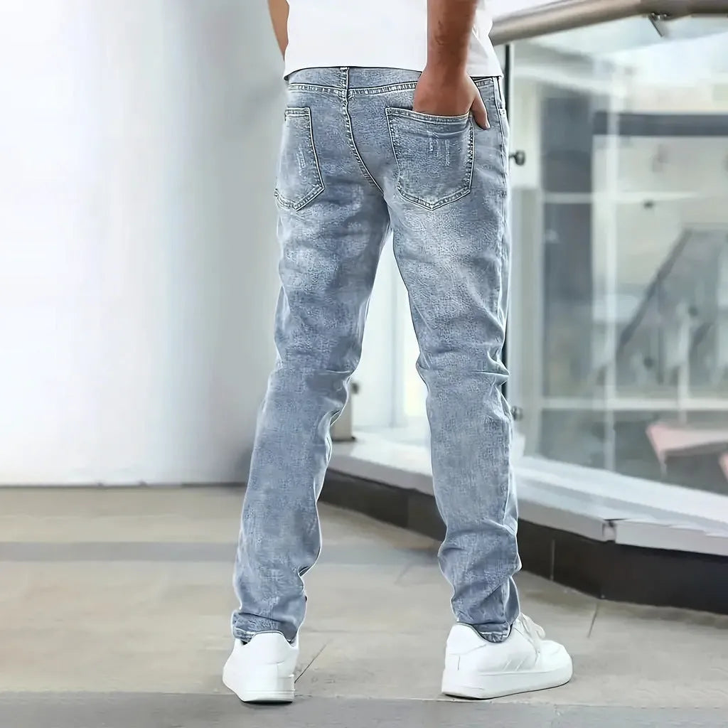 Men's slim straight stretch jeans in black cotton fabric with mid-waist and zipper fly
