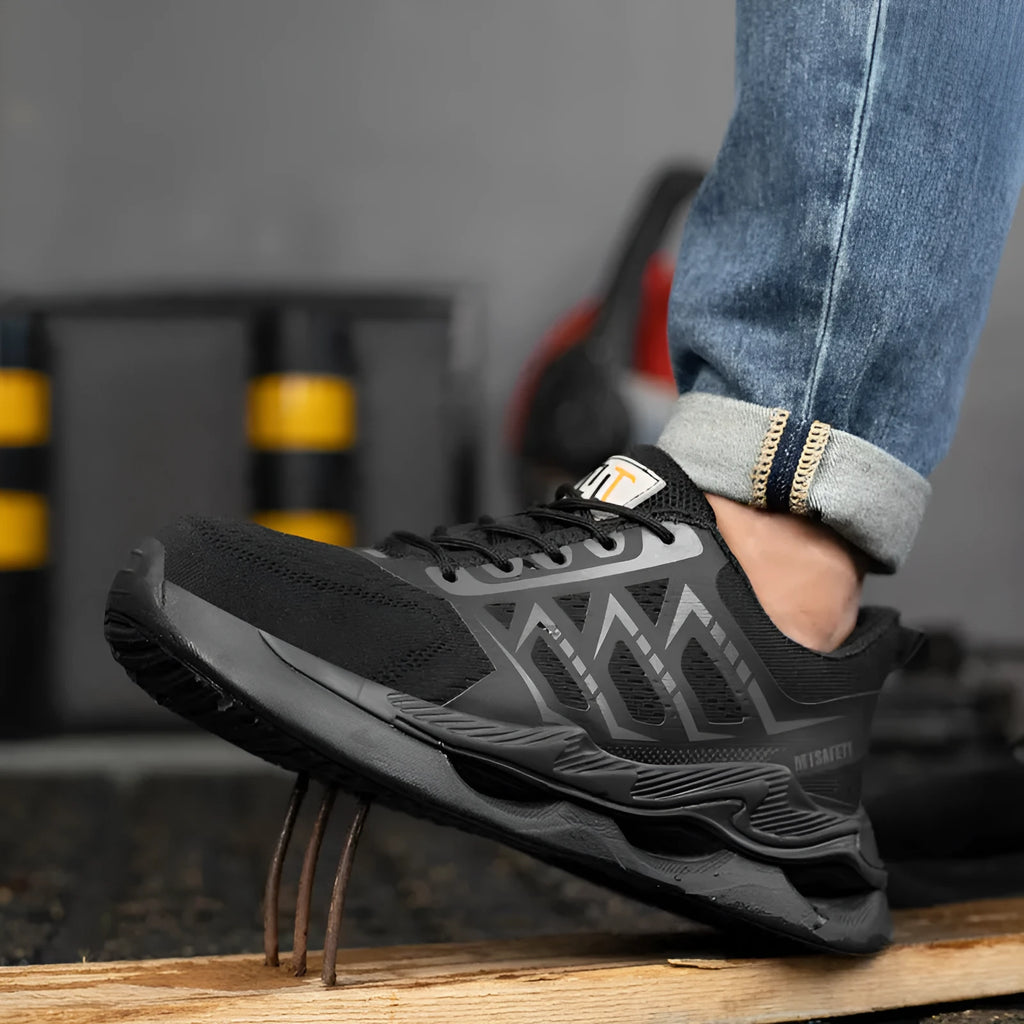Black steel toe cap labour protection shoes with flat-knitted uppers and lace-up front.