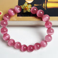 Handmade glass bead bracelet with floral designs in green, pink, white, or yellow colours