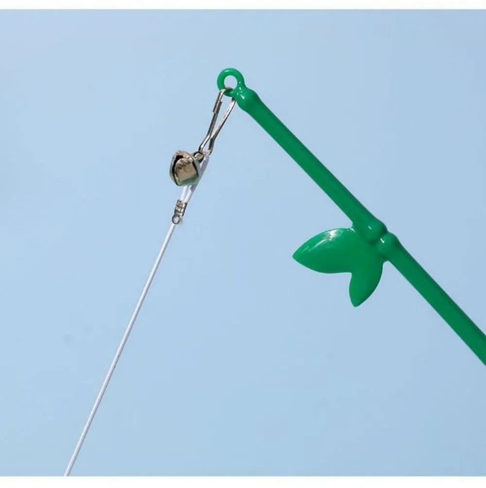 Green interactive cat wand toy with feather and bell attachments for stimulating play
