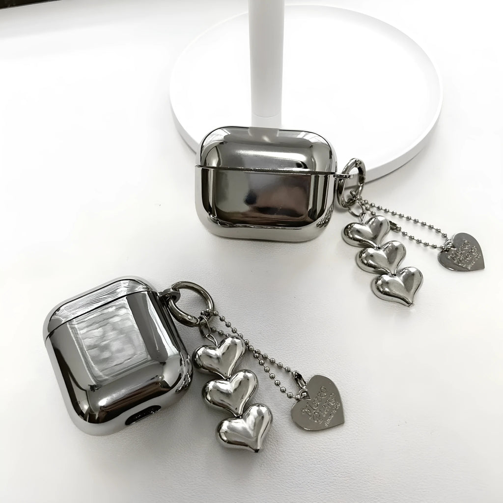 Electroplated TPU headphone case with heart pendant and bracelet chain decorative elements