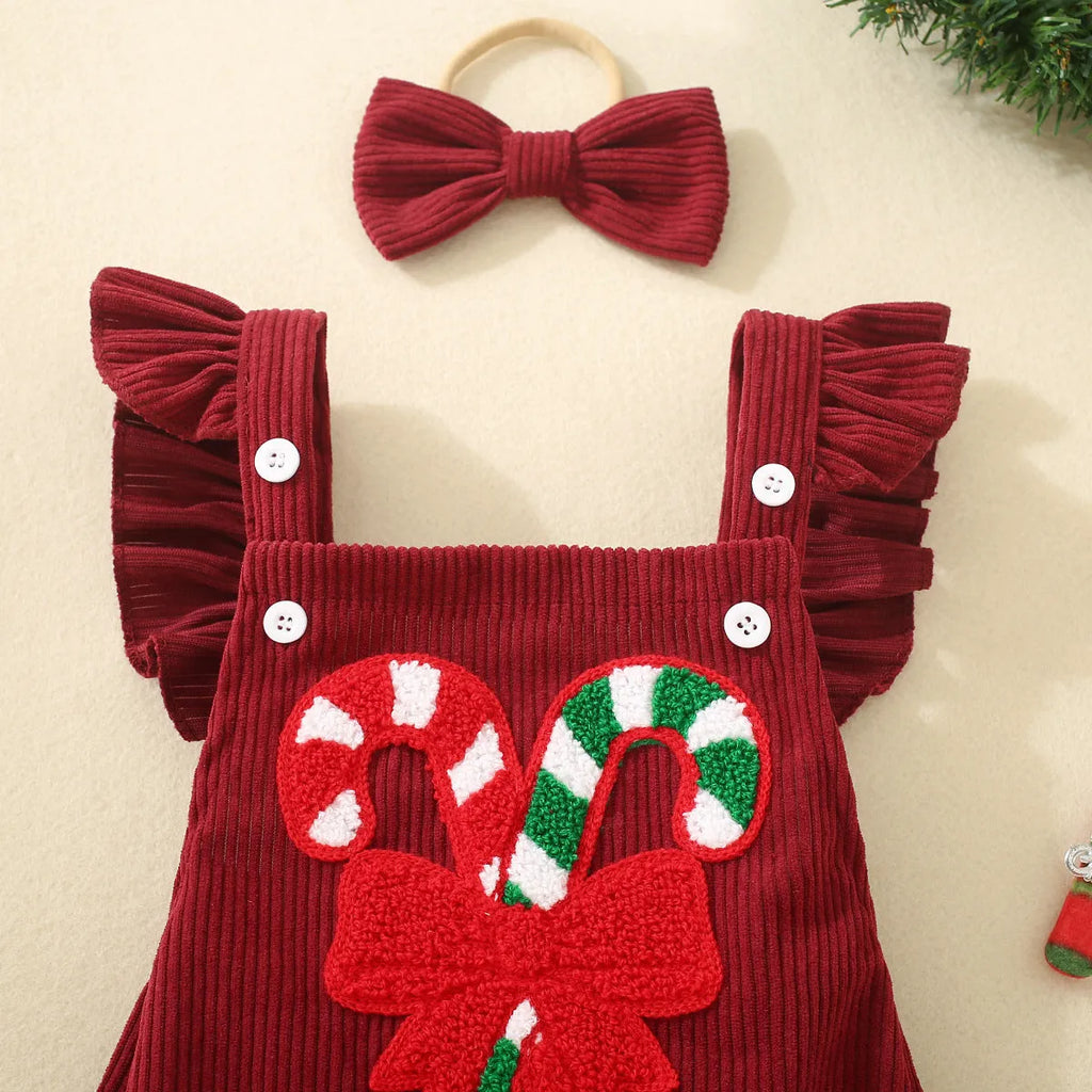 Red sleeveless cotton triangle romper for babies and toddlers with embroidered wing detail, shown in 70cm to 100cm sizes
